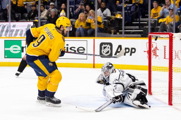 A shootout attempt by Filip Forsberg #9 of the Nashville Predators is deflected by Cal Petersen #40 of the Los Angeles Kings during overtime at Bridgestone Arena in Nashville, Tenn., on Oct. 18, 2022. (Brett Carlsen/Getty Images)