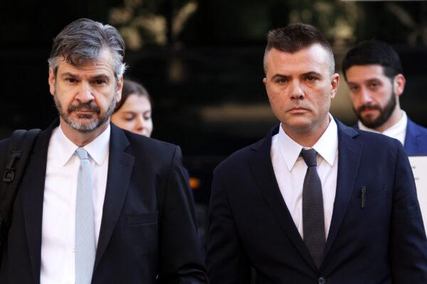 Russian analyst Igor Danchenko (R) arrives to court with a lawyer in Alexandria, Va., on Oct. 11, 2022. (Alex Wong/Getty Images)
