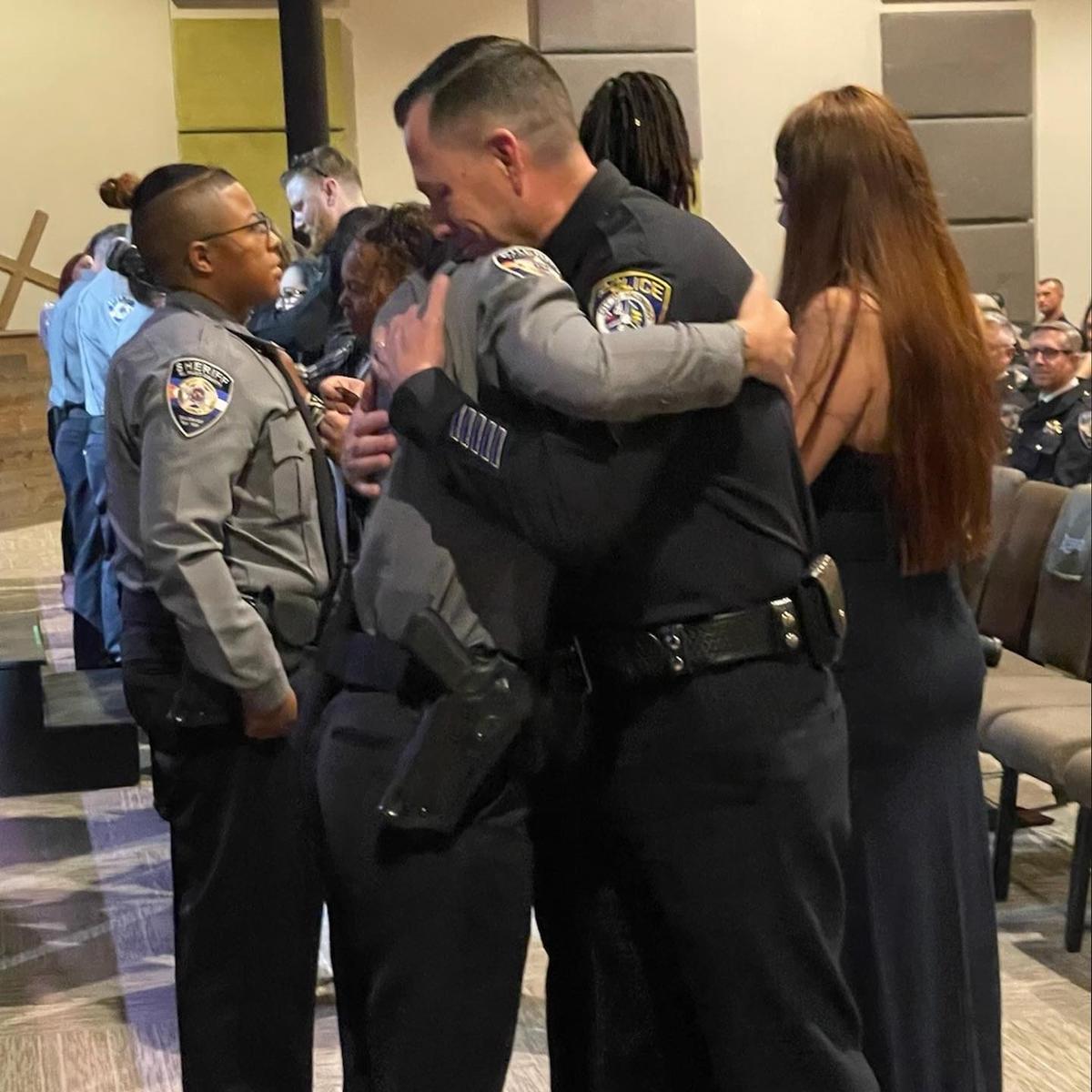 Sgt. Jeff Valdivia and Dep. Natalie Young's share a hug during her graduation from the El Paso County Sheriff’s Academy. (Courtesy of <a href="http://www.epcounty.com/sheriff/">El Paso County Sheriff’s Office</a>)