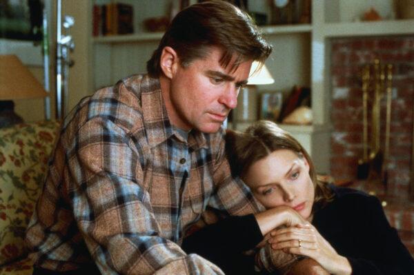 The parents of long-lost son Sam,  Pat (Treat Williams) and Beth (Michelle Pfeiffer) try to make sense of what has happened to their family, in a scene from "The Deep End of the Ocean." (MovieStillsDB)