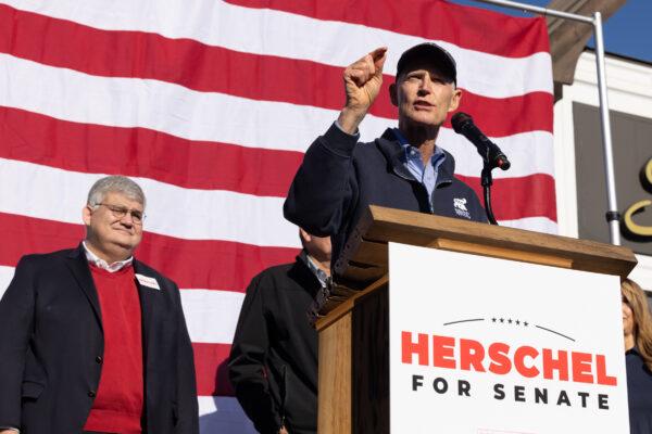Sen. Rick Scott (R-Fla.) addresses the crowd while campaigning for Georgia Republican Senate nominee Herschel Walker during an event in Macon, Georgia, on Oct. 20, 2022. (Jessica McGowan/Getty Images)