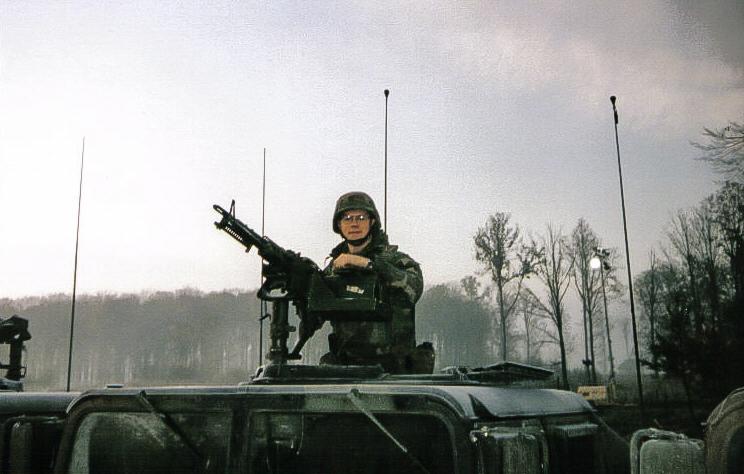 Michael Nichols in the gun turret of a U.S. Army Humvee in Bosnia-Herzegovina in 1996. (Courtesy of Whitney Nichols)