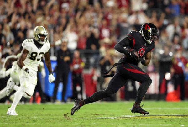Isaiah Simmons (9) of the Arizona Cardinals returns an interception for a touchdown during the 2nd quarter of the game against the New Orleans Saints at State Farm Stadium in Glendale, Ariz., on Oct. 20, 2022. (Christian Petersen/Getty Images)