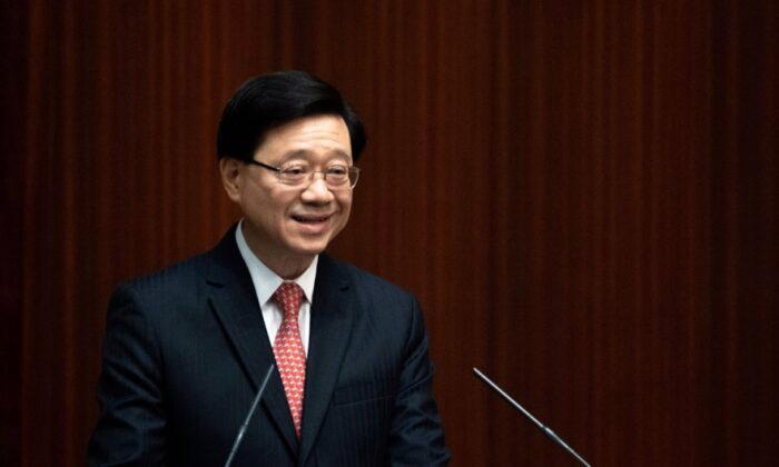 Hong Kong’s Leader Admits Loss of 140,000 Workers in Past Two Years