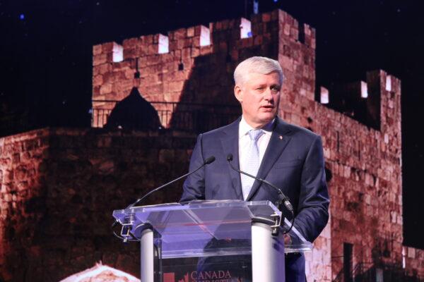 Former Prime Minister Stephen Harper was presented with an award for his support of Israel at a gala event co-hosted by the Israel Allies Foundation at the Canada Christian College in Whitby, Ont., on Oct. 20, 2022. (Andrew Chen/The Epoch Times)
