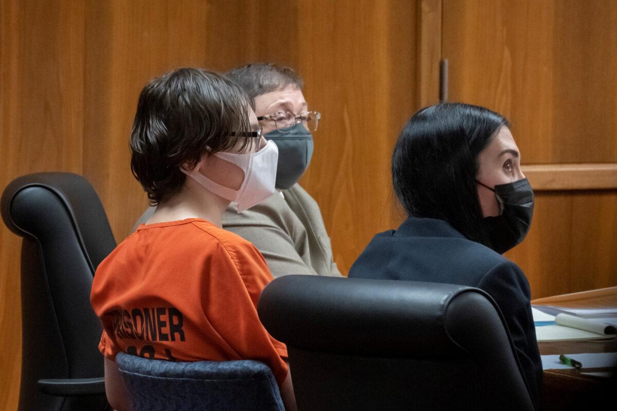 Ethan Crumbley and his defense attorneys Amy Hopp and Paulette Loftin attend a placement hearing at Oakland County circuit court in Pontiac, Mich., on Feb. 22, 2022. (David Guralnick/Pool via Reuters)