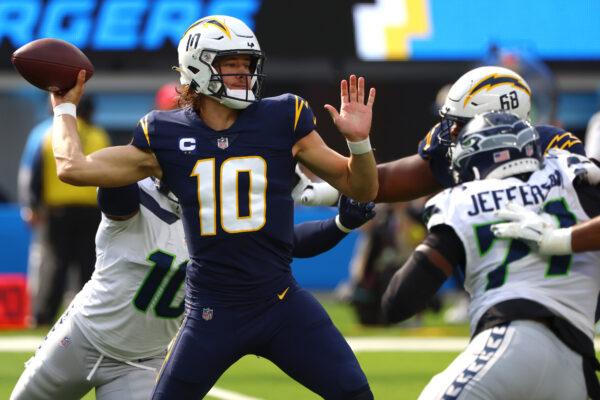 Justin Herbert (10) of the Los Angeles Chargers throws the ball during the first half of the game against the Seattle Seahawks at SoFi Stadium in Inglewood, Calif., on Oct. 23, 2022. (Katelyn Mulcahy/Getty Images)