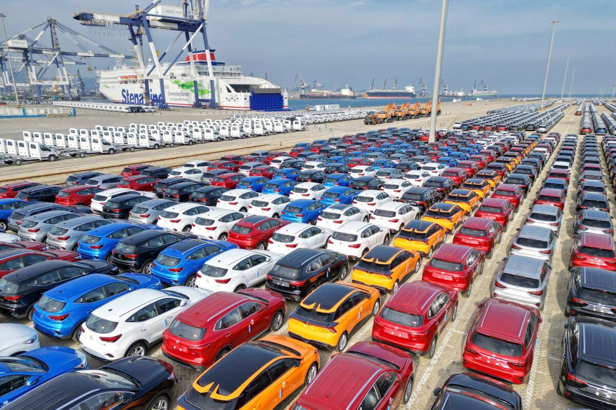 New vehicles are ready for export from a dockyard in Yantai in eastern China's Shandong Province on Oct. 13, 2022. (Chinatopix via AP)