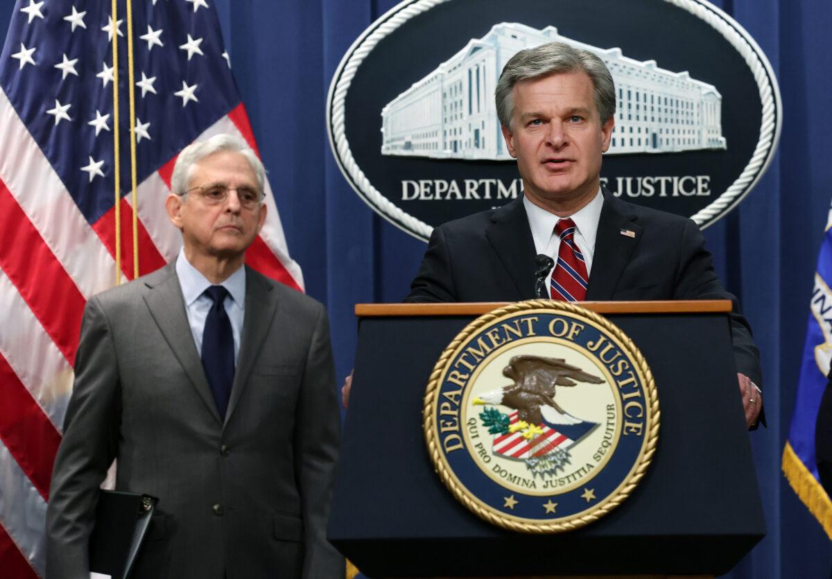 FBI Director Christopher Wray (R) and Attorney General Merrick Garland speak at a press conference at the Department of Justice in Washington on Oct. 24, 2022. (Kevin Dietsch/Getty Images)