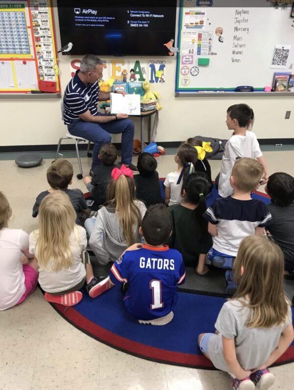 Shawn Hayston reads to his son's elementary school class. (Courtesy of Shawn Hayston)
