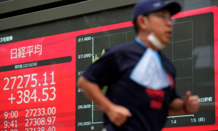 Global Shares Mixed After China Economy Slows, Hong Kong Down 6.4 Percent