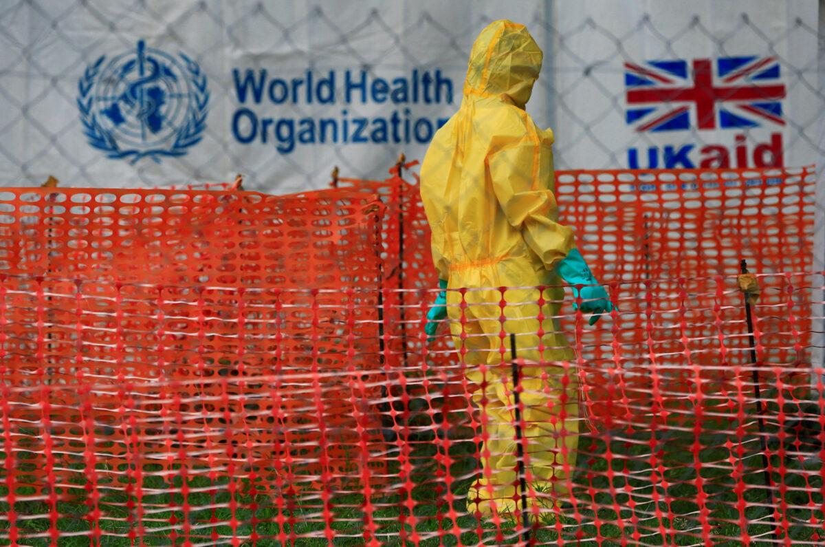 A person dressed in Ebola protective apparel inside an Ebola care facility at the Bwera general hospital near the border with the Democratic Republic of Congo in Bwera, Uganda, on June 14, 2019. (James Akena/Reuters)