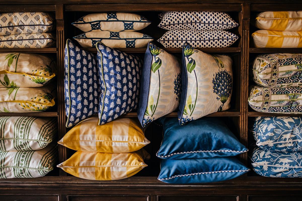 A wall decked in pillows features beautiful fabrics. (Handout/TNS)