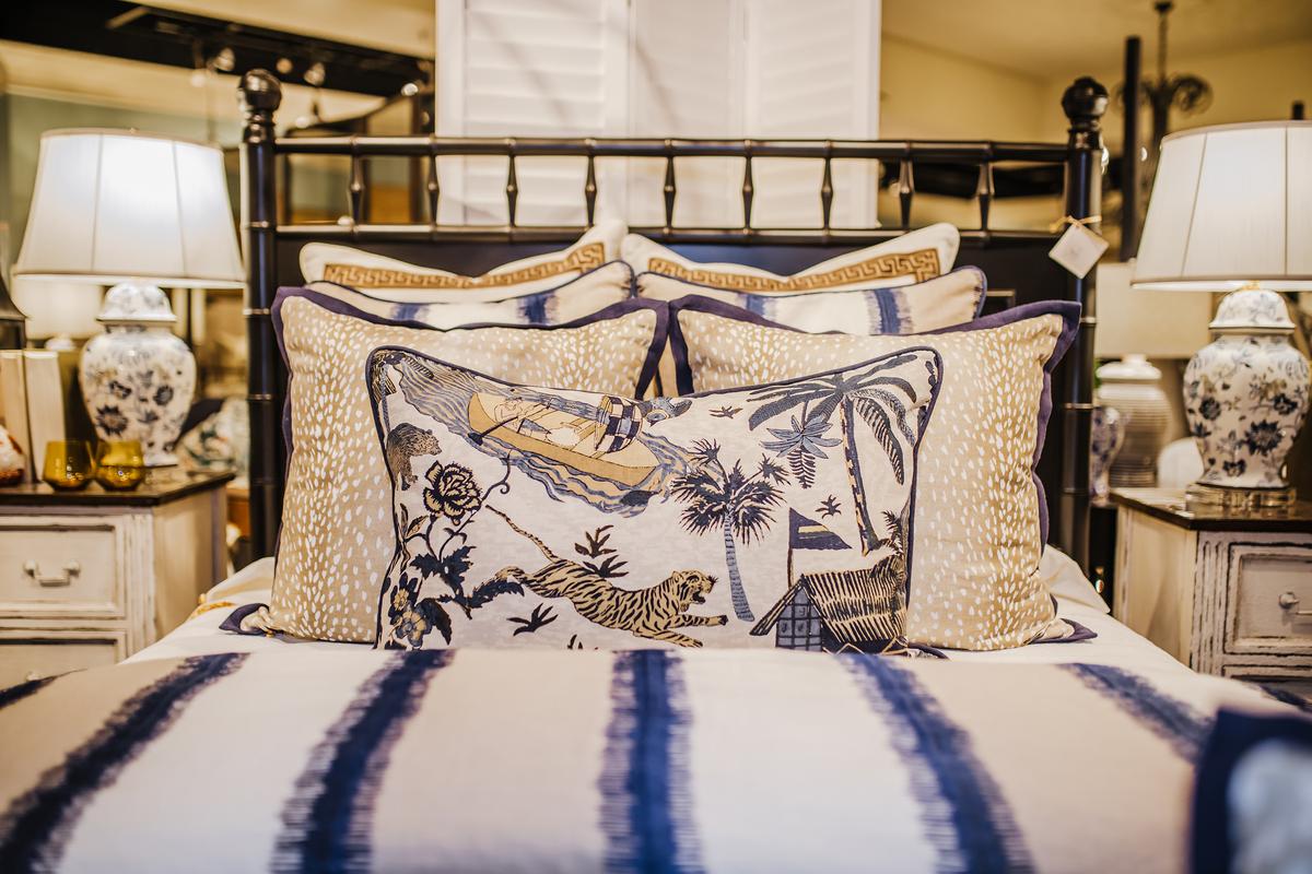 Three rows of Euro pillows and a decorative pillow adorn create a statement with this blue-and-white duvet. (Handout/TNS)