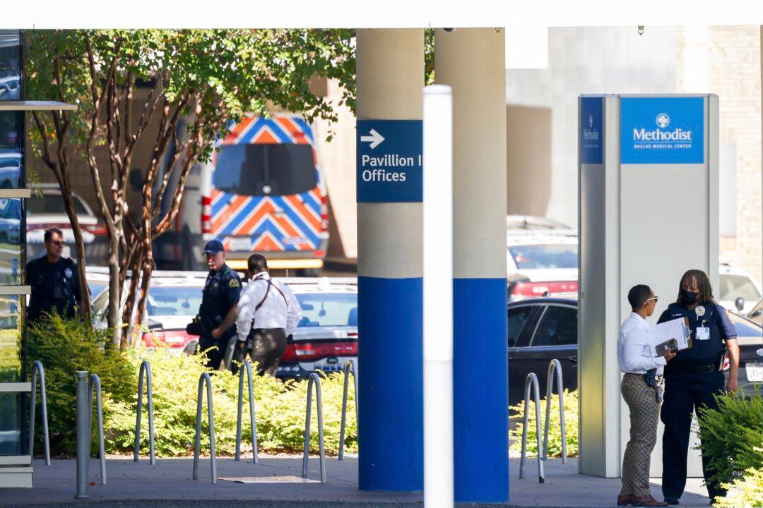 Official: Dallas Shooter Was Attending Birth at Hospital