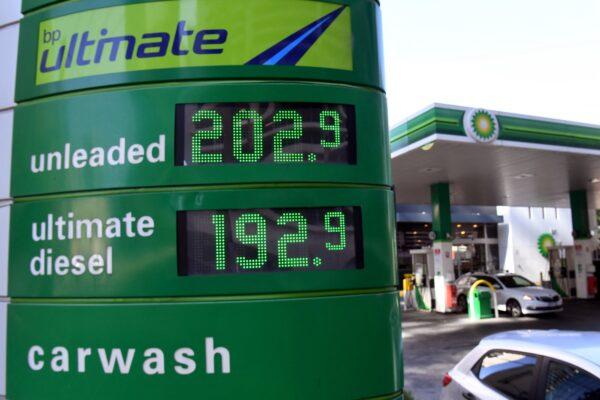 A sign outside a petrol station shows the price of petrol breaking through the two Australian dollar a litre mark in Melbourne, Australia, on March 3, 2022. (William West/AFP via Getty Images)