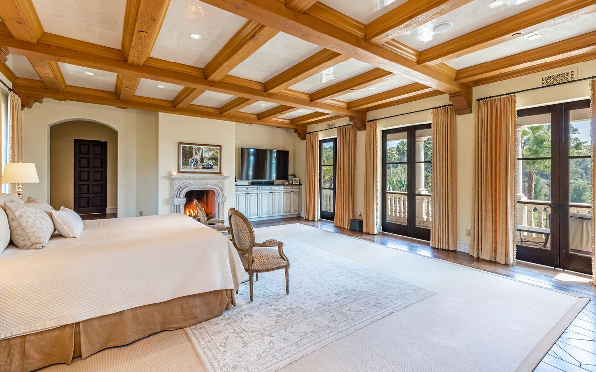 The bedrooms all feature extensive custom millwork and huge windows to view the property’s magnificent grounds. (Courtesy of Simon Berlyn for Sotheby’s International Realty)