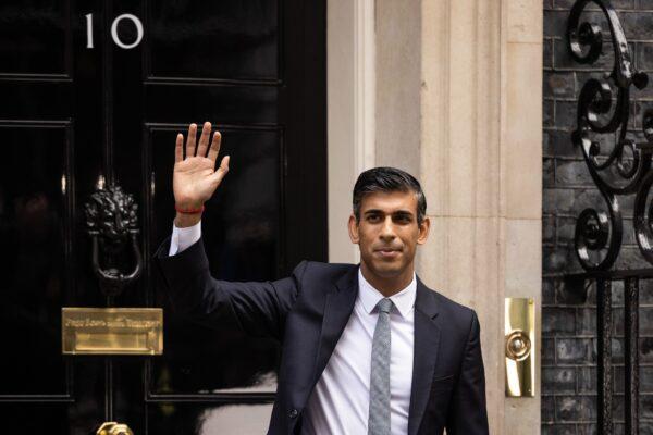 British Prime Minister Rishi Sunak waves to members of the media after taking office outside Number 10 in Downing Street, London, on Oct. 25, 2022. (Dan Kitwood/Getty Images)