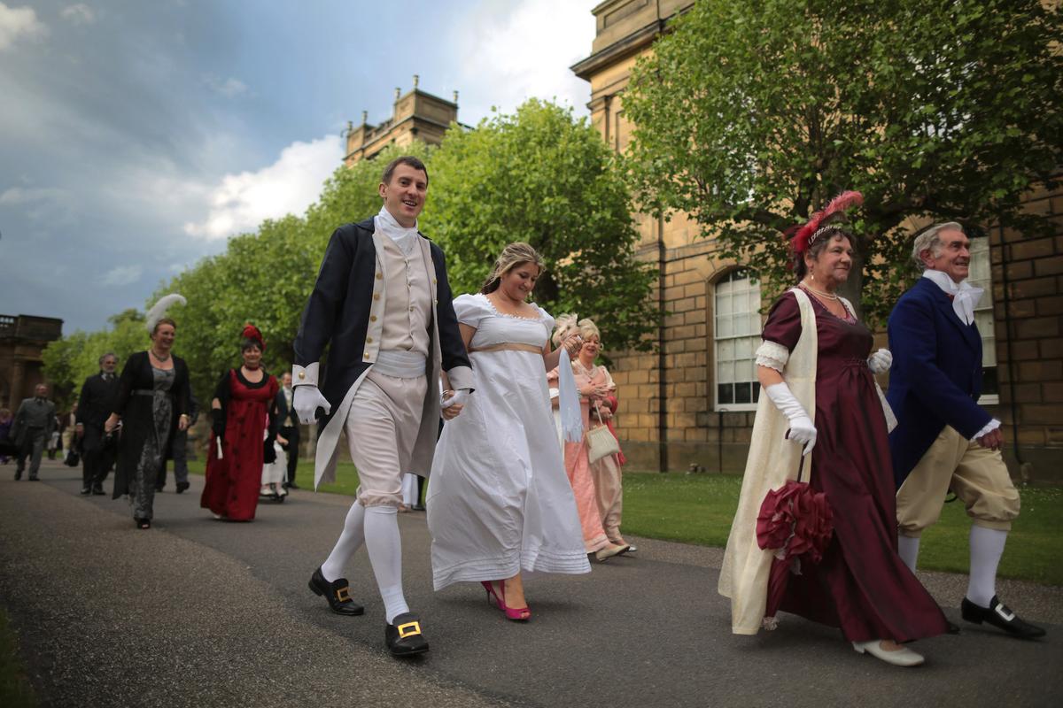 Costumed guests arrive for the Pride and Prejudice Ball at Chatsworth House in Derbyshire Dales, England, on June 22, 2013. The event was organized to celebrate the 200th anniversary of the publication of Jane Austen's "Pride and Prejudice." (Christopher Furlong/Getty Images)