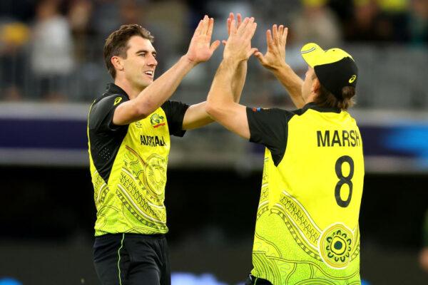 Pat Cummins of Australia (L) celebrates his wicket during the ICC Men's T20 World Cup match between Australia and Sri Lanka at Perth Stadium in Australia, on Oct. 25, 2022. (James Worsfold/Getty Images)