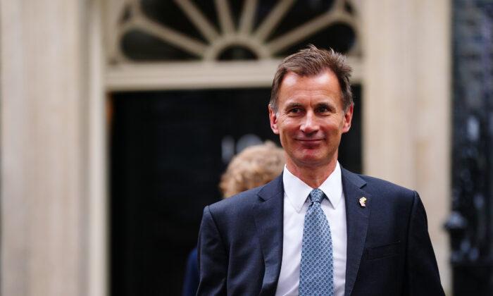 Jeremy Hunt Says UK Must ‘Face Into the Storm’ as He Raises Taxes and Makes £55 Billion Cuts