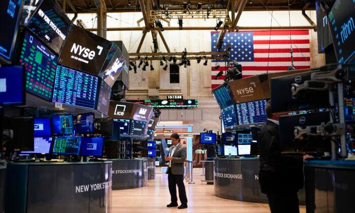 Traders work on the floor at the New York Stock Exchange in New York on Aug. 10, 2022. (Seth Wenig/AP Photo)