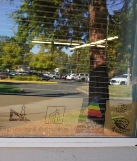 A pro-LGBT sticker in the window of Grants Pass High School in Grants Pass, Ore., on Oct. 18, 2022. (Jackson Elliott/The Epoch Times)