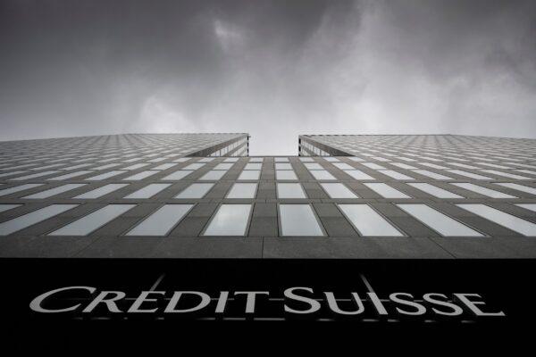 Grey clouds cover the sky over a building of the Credit Suisse bank in Zurich on Feb. 21, 2022. (Ennio Leanza/Keystone via AP)