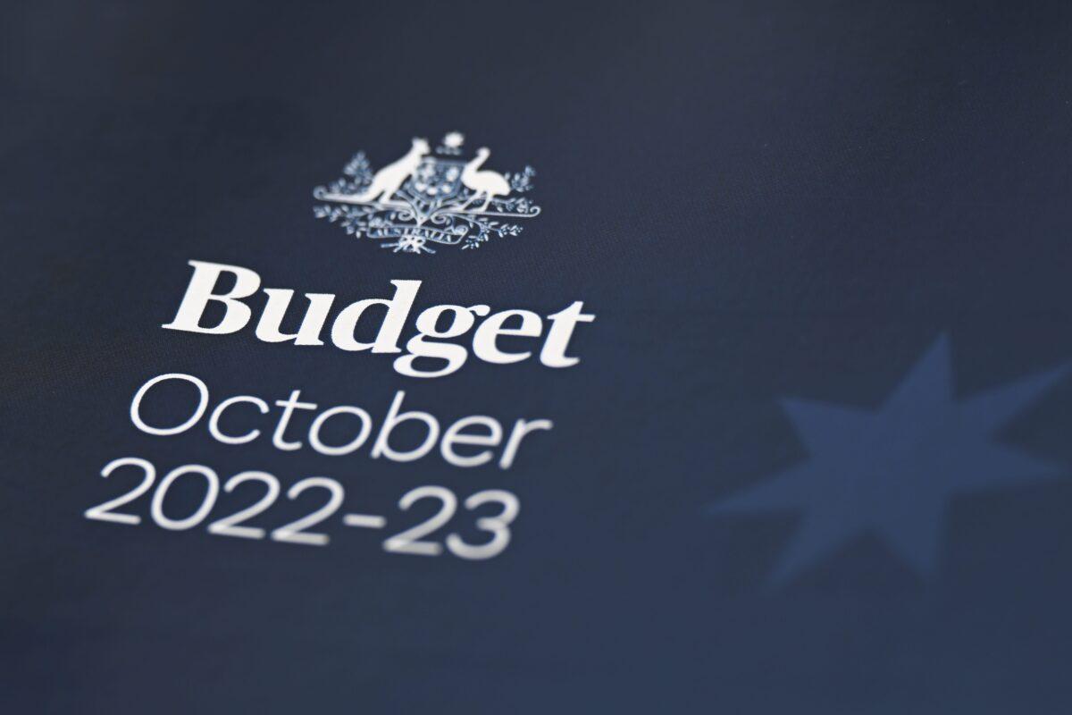 The cover of the 2022–23 Federal Budget papers is seen inside the Budget lockup at Parliament House in Canberra, Australia, on Oct. 25, 2022. (AAP Image/Lukas Coch)