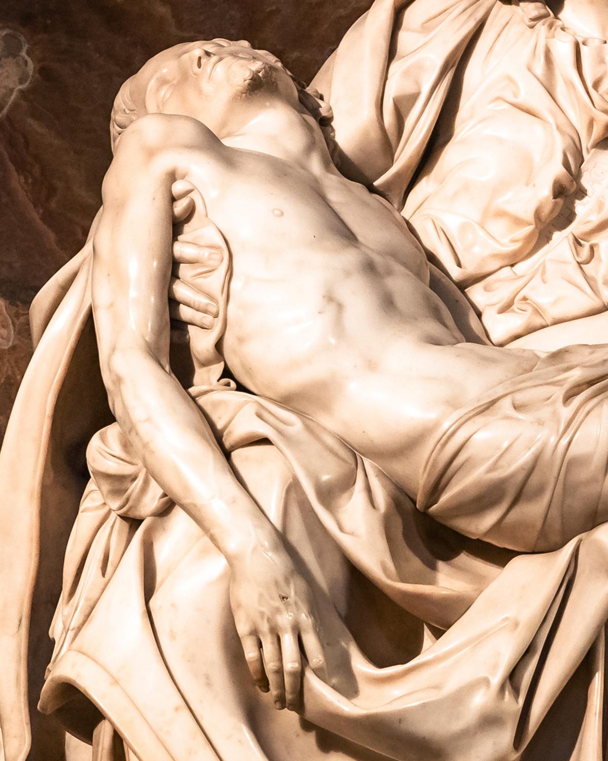 A detail of Jesus from Michelangelo's "Pietà." (PhotoFires/Shutterstock)