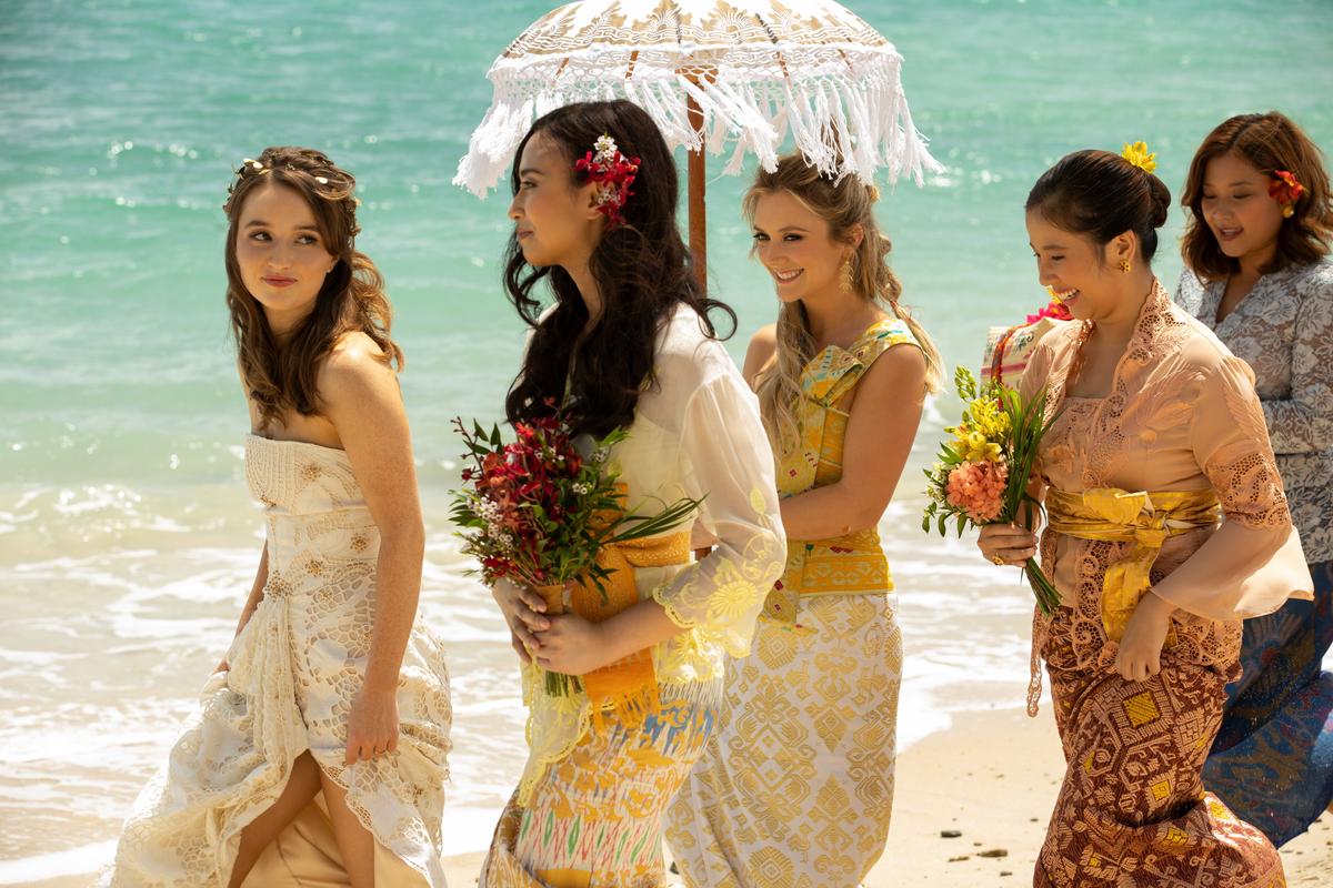 Soon-to-be-wed law student Lily Cotton (Kaitlyn Dever, L) and her bestie Wren Butler (Billie Lourd, C), with Lily's other maids of honor, in "Ticket to Paradise." (Universal Pictures)