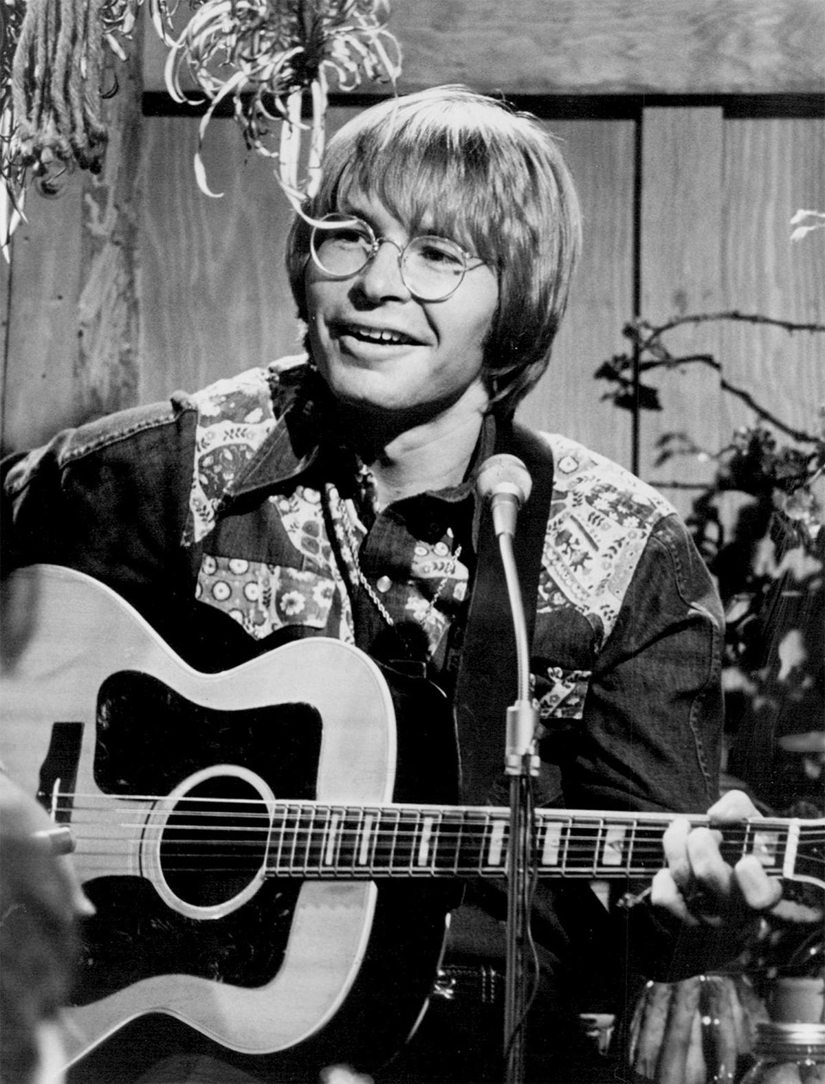 A photograph from John Denver's appearance on ABC's televised special "An Evening With John Denver," filmed on Feb. 18, 1975. (Public Domain)