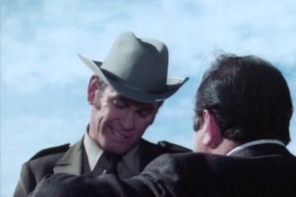 Small-town cop Sergeant Magruder (Earl Holliman, L) doesn’t like Cannon (William Conrad) at first sight, in “Cannon.” (Quinn Martin Productions)