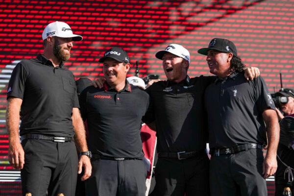 Team Captain Dustin Johnson, Talor Gooch, Patrick Reed and Pat Perez of Team 4 Aces GC on the podium after winning the team championship stroke-play round of the LIV Golf Invitational—Miami at Trump National Doral, in Doral, Flor., on October 30, 2022. (Eric Espada/Getty Images)