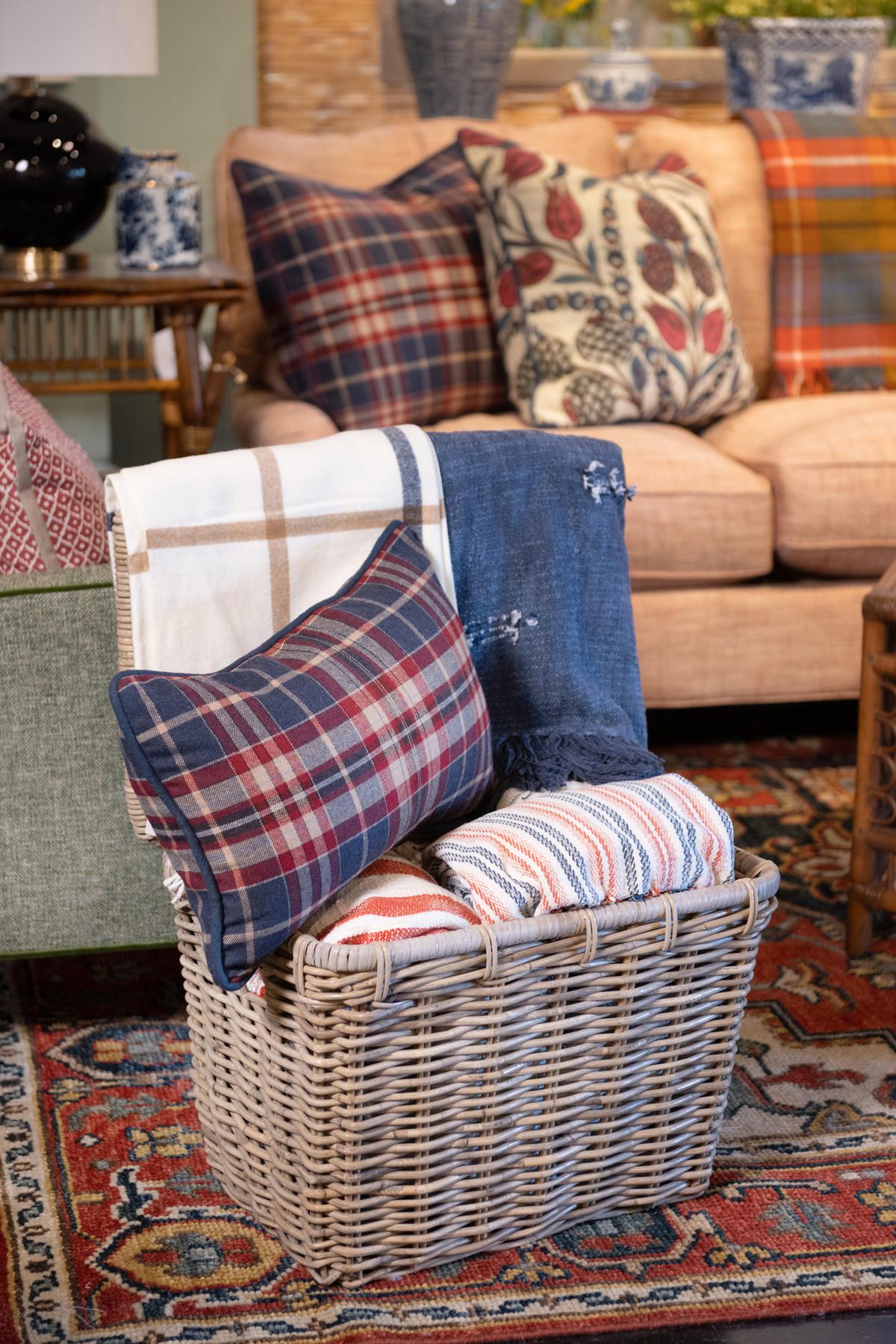 Store extra pillows and blankets in decorative baskets when not in use for an unexpected design element. (Handout/TNS)