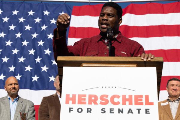Georgia Republican Senate nominee Herschel Walker addresses a crowd of supporters during a campaign stop in Macon, Ga., on Oct. 20, 2022. (Jessica McGowan/Getty Images)