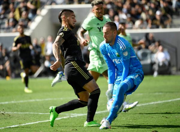 Goalkeeper Brad Stuver (1) of Austin FC makes a save against Cristian Arango (9) of Los Angeles FC during the first half of the Western Conference Finals of the 2022 MLS Cup Playoffs at Banc of California Stadium in Los Angeles, on Oct. 30, 2022. (Kevork Djansezian/Getty Images)