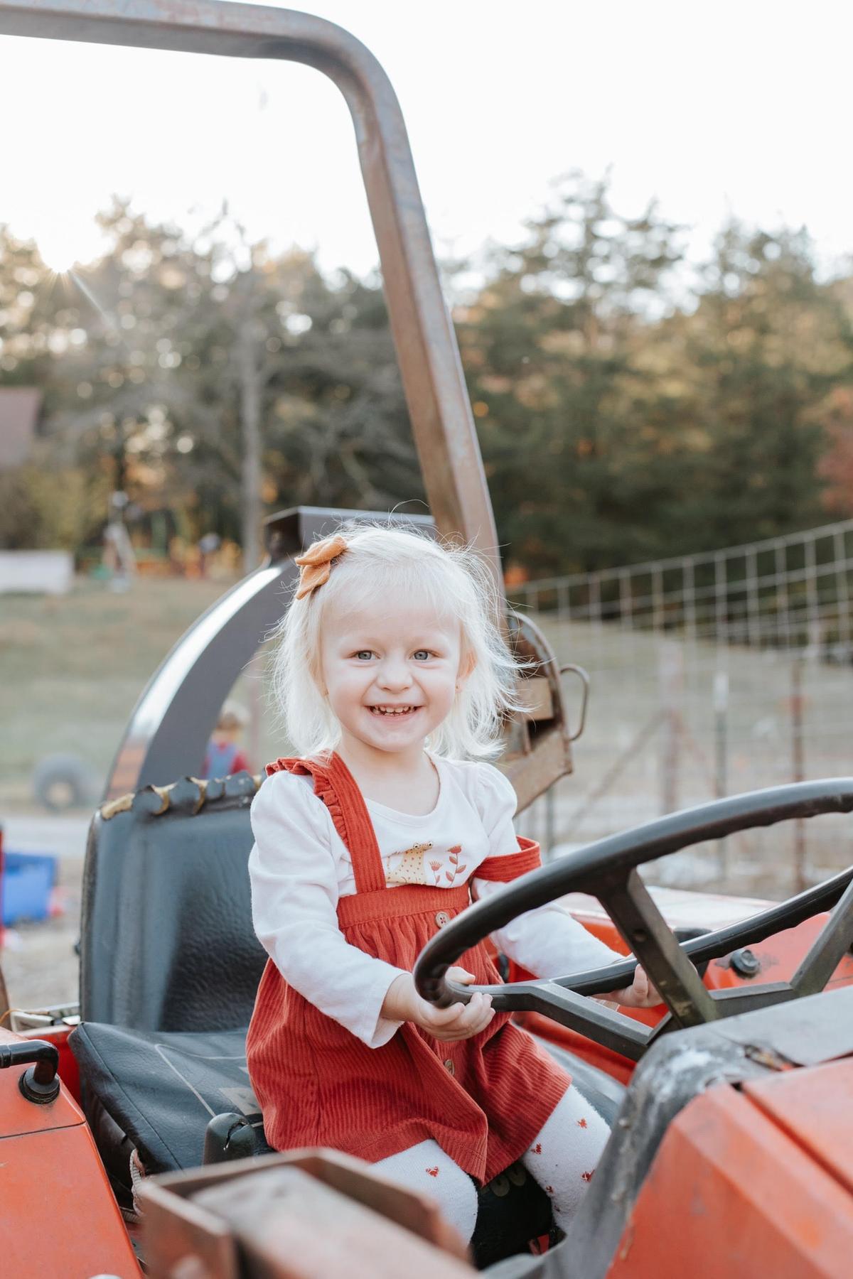 Cortney and Samuel Black's daughter helping on the farm. (Courtesy of The Tiffaney Lawson Company)