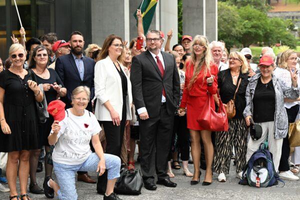 Dr William Bay (centre) is seen with his supporters outside the Brisbane Supreme Court in Brisbane, Australia, on Nov. 30, 2022. (AAP Image/Darren England)
