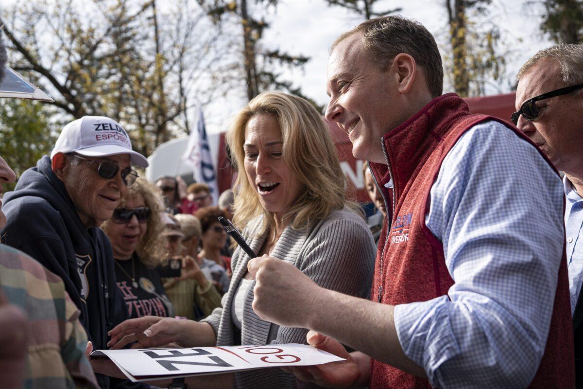 Alison Esposito, Lieutenant governor candidate (L) and Republican gubernatorial nominee Rep. Lee Zeldin (R-N.Y.) interact with supporters at “Get Out the Vote Rally” in Thornwood, Westchester county, in New York, on Oct. 31, 2022. (Chung I Ho/The Epoch Times)