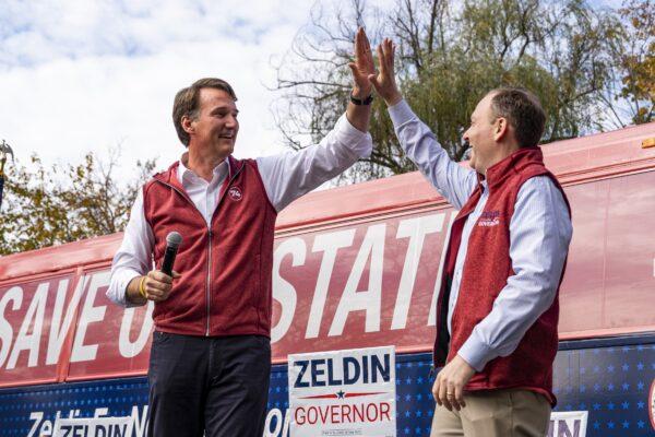 Virginia Gov. Glenn Youngkin (L) and Republican gubernatorial nominee Rep. Lee Zeldin (R-N.Y.) appear on stage at a “Get Out the Vote Rally” in Thornwood, Westchester county in N.Y. on Oct. 31, 2022. (Chung I Ho/The Epoch Times)