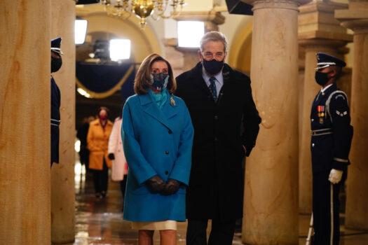 Speaker of the House Nancy Pelosi and her husband Paul Pelosi arrive in the Crypt of the US Capitol for President-elect Joe Biden's inauguration ceremony to be the 46th President of the United States on January 20, 2021 in Washington, DC. (Jim Lo Scalzo-Pool/Getty Images)
