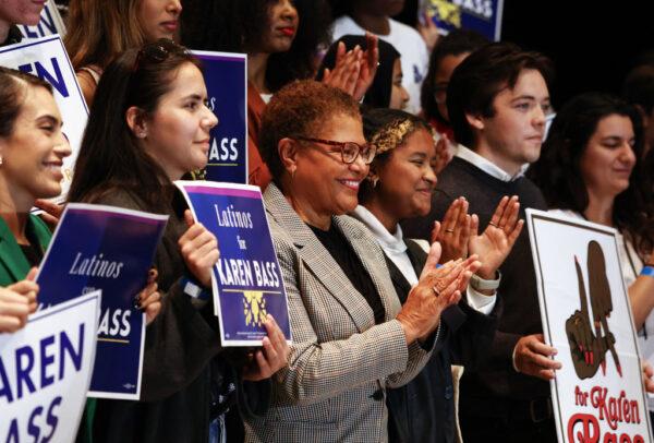 Los Angeles Democratic mayoral candidate, U.S. Rep. Karen Bass (D-Calif.), C, applauds as Sen. Bernie Sanders (I-Vt.) speaks at a campaign rally for Bass in Los Angeles on Oct. 27, 2022. (Mario Tama/Getty Images)