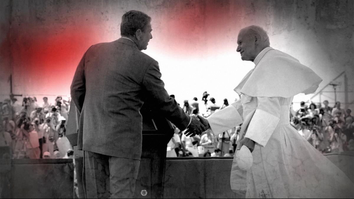 Joining forces - President Ronald Reagan (L) and Pops John Paul II shake hands in “The Divine Plan” (The Nexus Project)