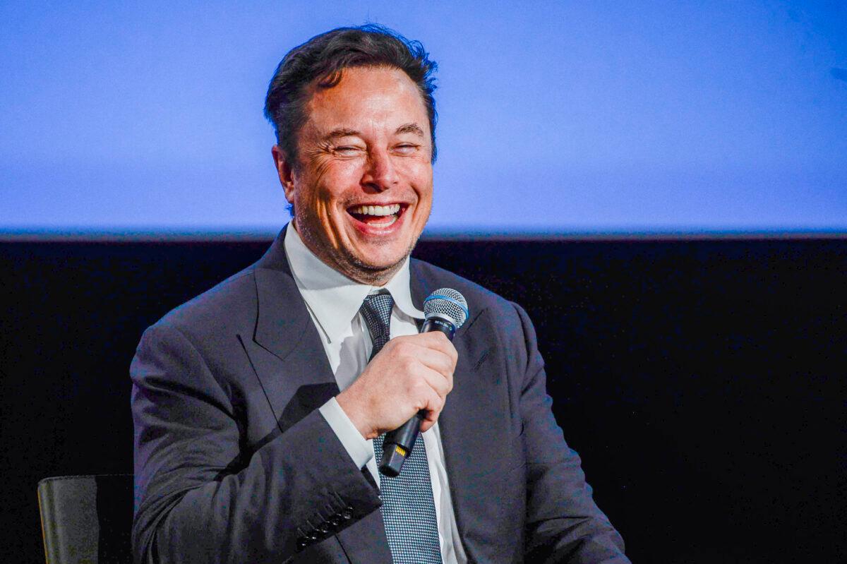 Tesla CEO Elon Musk smiles as he addresses guests at the Offshore Northern Seas 2022 (ONS) meeting in Stavanger, Norway on Aug. 29, 2022. (Carina Johansen/NTB/AFP via Getty Images)