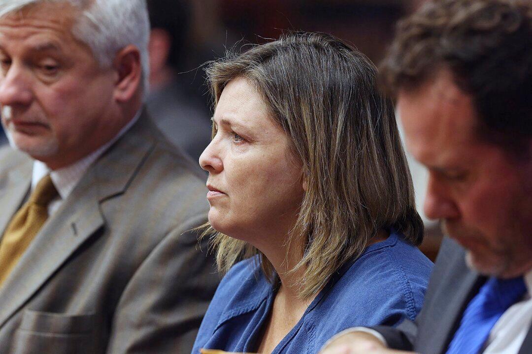 Woman Testifies That Husband Wanted 8 Family Members Killed