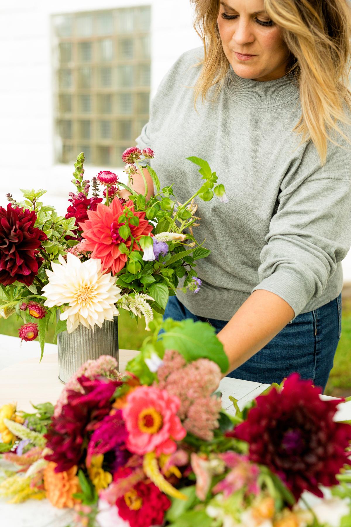 Britney Zondlak arranging flowers grown by Two Sisters Flower Farm. (Courtesy of Britney Zondlak)