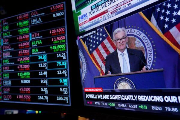 On the floor at the New York Stock Exchange as the Federal Reserve chairman Jerome Powell speaks after announcing a rate increase in New York, on Nov. 2, 2022. (Seth Wenig/AP Photo)