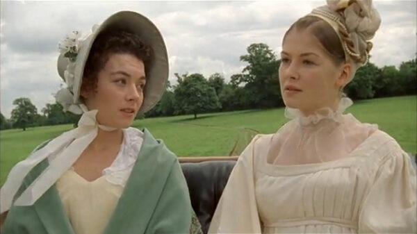 Molly Gibson (Justine Waddell, L) and young noblewoman Lady Harriet Cumnor (Rosamund Pike), who wears a subdued hairstyle, in an early scene from "Wives and Daughters." (BBC)