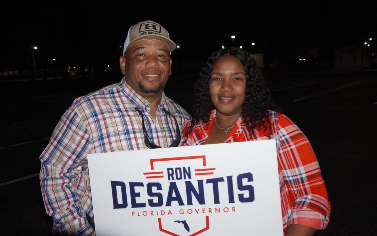 Charles and Joyell Welch, of Lake Butler, Florida, leave smiling after a North Florida reelection rally for Florida Gov. Ron DeSantis on Nov. 3, 2022. (Nanette Holt/The Epoch Times)